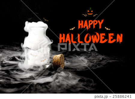 Happy halloween text with white smoke in glass  25886241