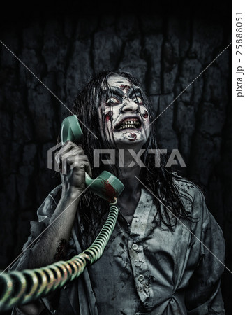 Horror zombie girl calling by phone 25888051