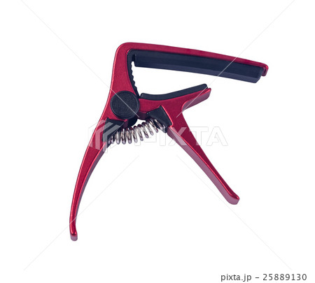 Guitar red capo on white background , close up Guitar red capo on white background , close up 25889130