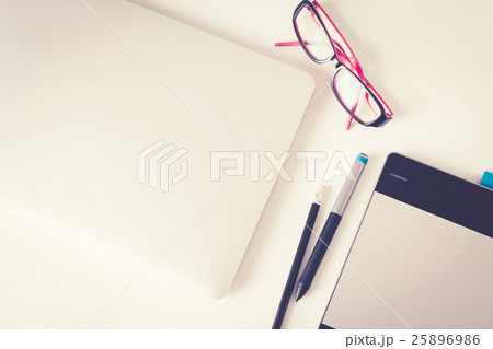 Close-up of comfortable working place with laptop, vintage effec 25896986