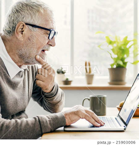 Senior Adult Using Laptop Thinking Concept Senior Adult Using Laptop Thinking Concept 25903006
