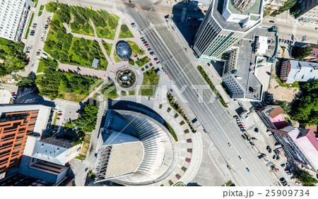 Aerial city view with roads, houses and buildings. 25909734