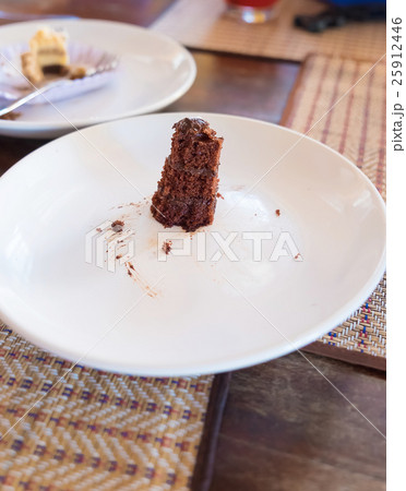 The Last piece of delicious slice of Black Forrest Cake. On a pl 25912446