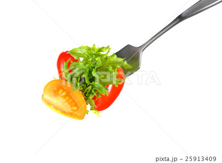 Mixed salad on fork isolated on white Mixed salad on fork isolated on white 25913409