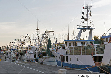 fishing boats in port canal in Rimini, Italy fishing boats in port canal in Rimini, Italy 25916968
