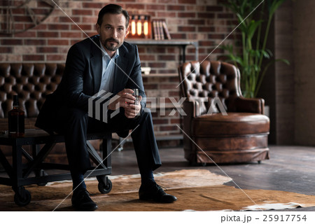 Confident brutal man looking at you Confident brutal man looking at you 25917754