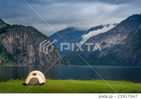 Scenic Norway fjord landscape with touristic tent Scenic Norway fjord landscape with touristic tent 25917947