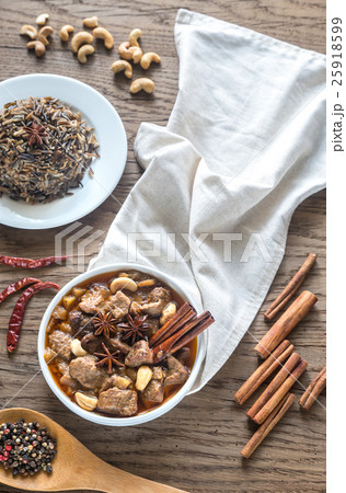 Thai Massaman Curry on the wooden background Thai Massaman Curry on the wooden background 25918599