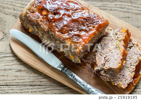 Meat loaf with barbecue sauce on the wooden board Meat loaf with barbecue sauce on the wooden board 25919195