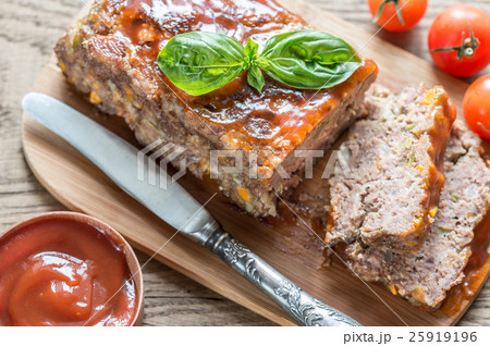 Meat loaf with barbecue sauce on the wooden board Meat loaf with barbecue sauce on the wooden board 25919196