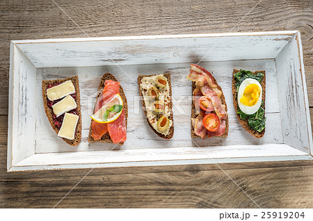 Bruschetta with different toppings 25919204