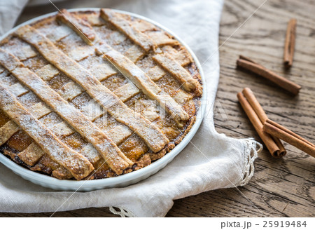 Pumpkin pie on the wooden background 25919484