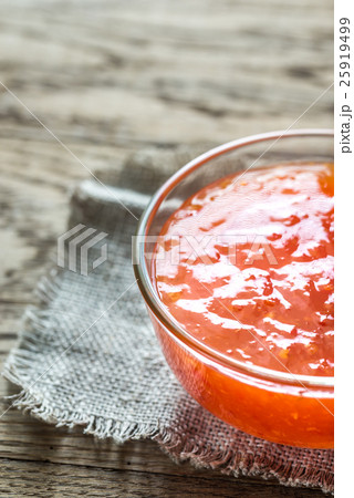 Glass bowl of thai sweet chili sauce 25919499