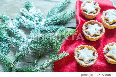 Mince pies with Christmas tree branch 25920061
