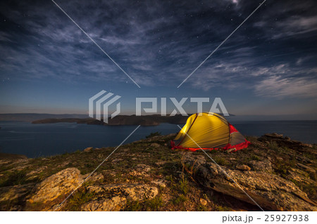 Tent against mountain at night 25927938