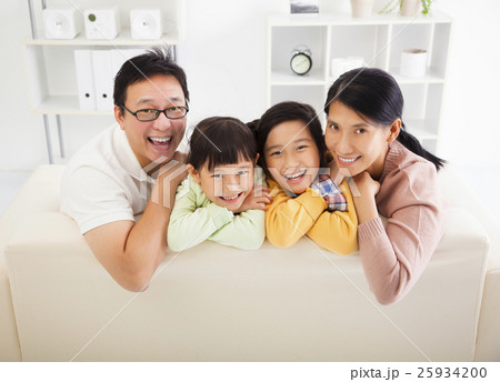 happy asian family in the living room 25934200
