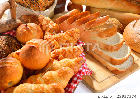 Bread and rolls isolated on white background Bread and rolls isolated on white background 25937374