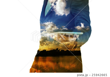 Businessman with tablet double exposure 25942665