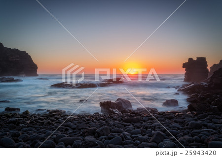 Gorgeous sunset on the stone beach. Gorgeous sunset on the stone beach. 25943420