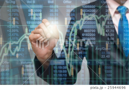 Businessman writing the trading graph of stock market on the virtual screen on photo blurred of citysscape building background, Business stock market and trading concept 25944696