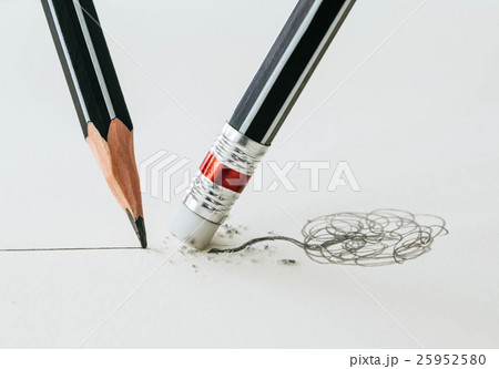 Close up of a pencil eraser removing a crooked. Close up of a pencil eraser removing a crooked. 25952580