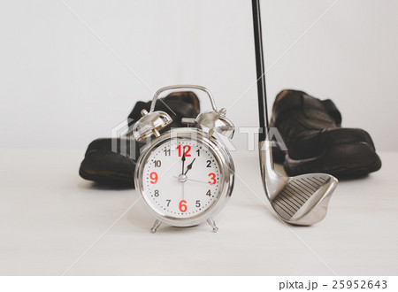 golf club and alarm clock with business leather 25952643