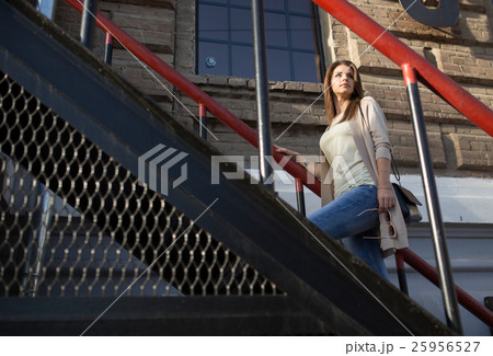 Young pretty woman outdoor fashion portrait 25956527