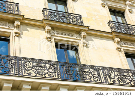 Facade of traditional apartment building in Paris Facade of traditional apartment building in Paris 25961913