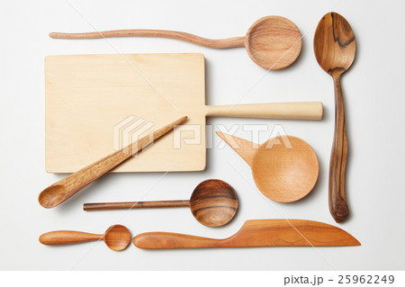 Various kitchen utensil on white wooden background Various kitchen utensil on white wooden background 25962249