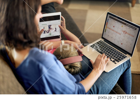 Family Relax Happiness Using Tablet Concept 25971658