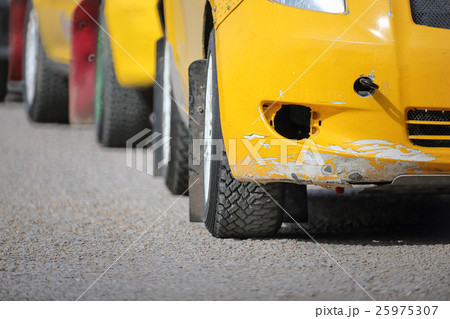 row  of rally car at start line 25975307