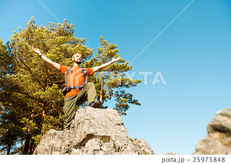 Young male with beard is traveling through the 25975848