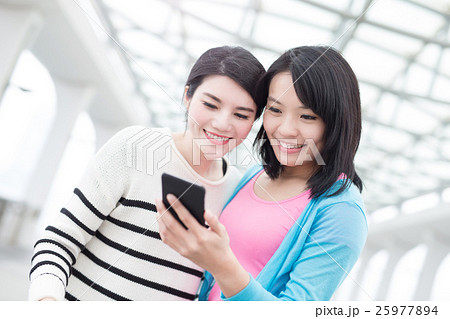 two woman selfie in hongkong 25977894
