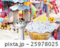 Burning joss sticks and big oil lamp in the temple 25978025