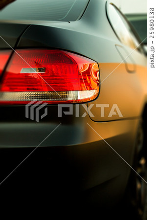 Matt black sports car. Rear View 25980138