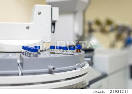 Vials in the autosampler tray. Chemistry lab 25981212