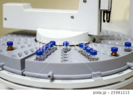 Vials in the autosampler tray. Chemistry lab 25981215