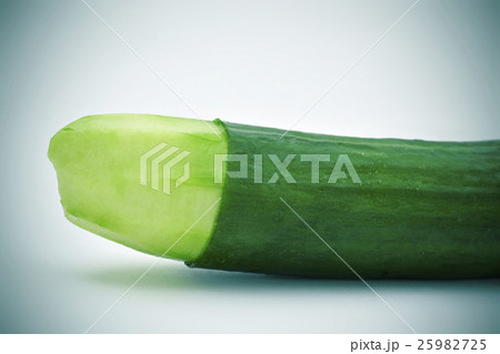 cucumber with the skin of its tip removed 25982725