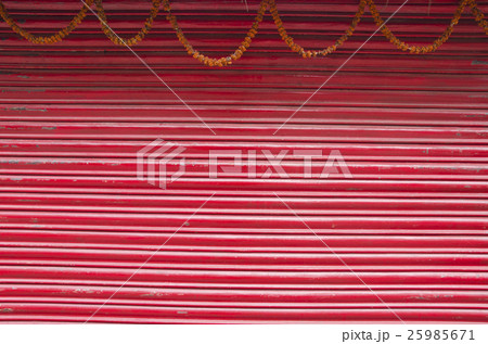 red corrugated metal door and flowers garland red corrugated metal door and flowers garland 25985671