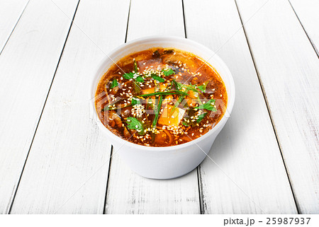 Hot food delivery - miso soup isolated 25987937