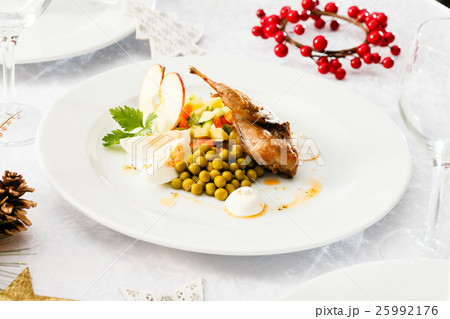 quail with salad on Christmas table 25992176