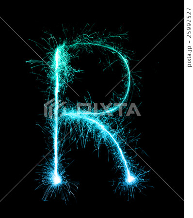 Sparkler firework light alphabet R at night 25992527
