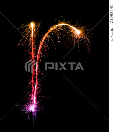 Sparkler firework light alphabet r at night 25992540