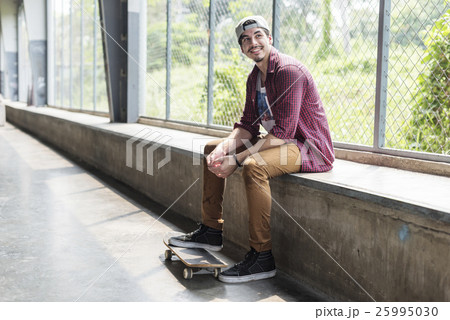 Man Skateboarder Lifestyle Relax Hipster Concept Man Skateboarder Lifestyle Relax Hipster Concept 25995030