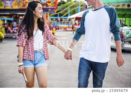 Couple Dating Amusement Park Funfair Festive Playful Happiness Concept Couple Dating Amusement Park Funfair Festive Playful Happiness Concept 25995679