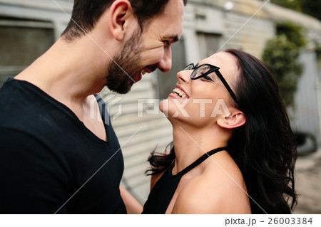 guy and girl in each other's arms guy and girl in each other's arms 26003384