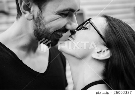 guy and girl in each other's arms 26003387