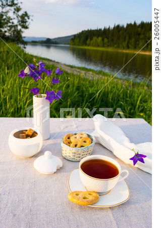 Evening tea sunset river view 26005447