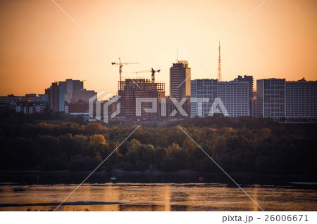 Beautiful sunset over silhouette city skyline and 26006671