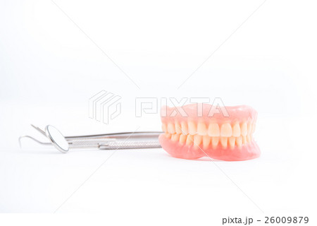 Photo of full dentures and dental mirror  26009879